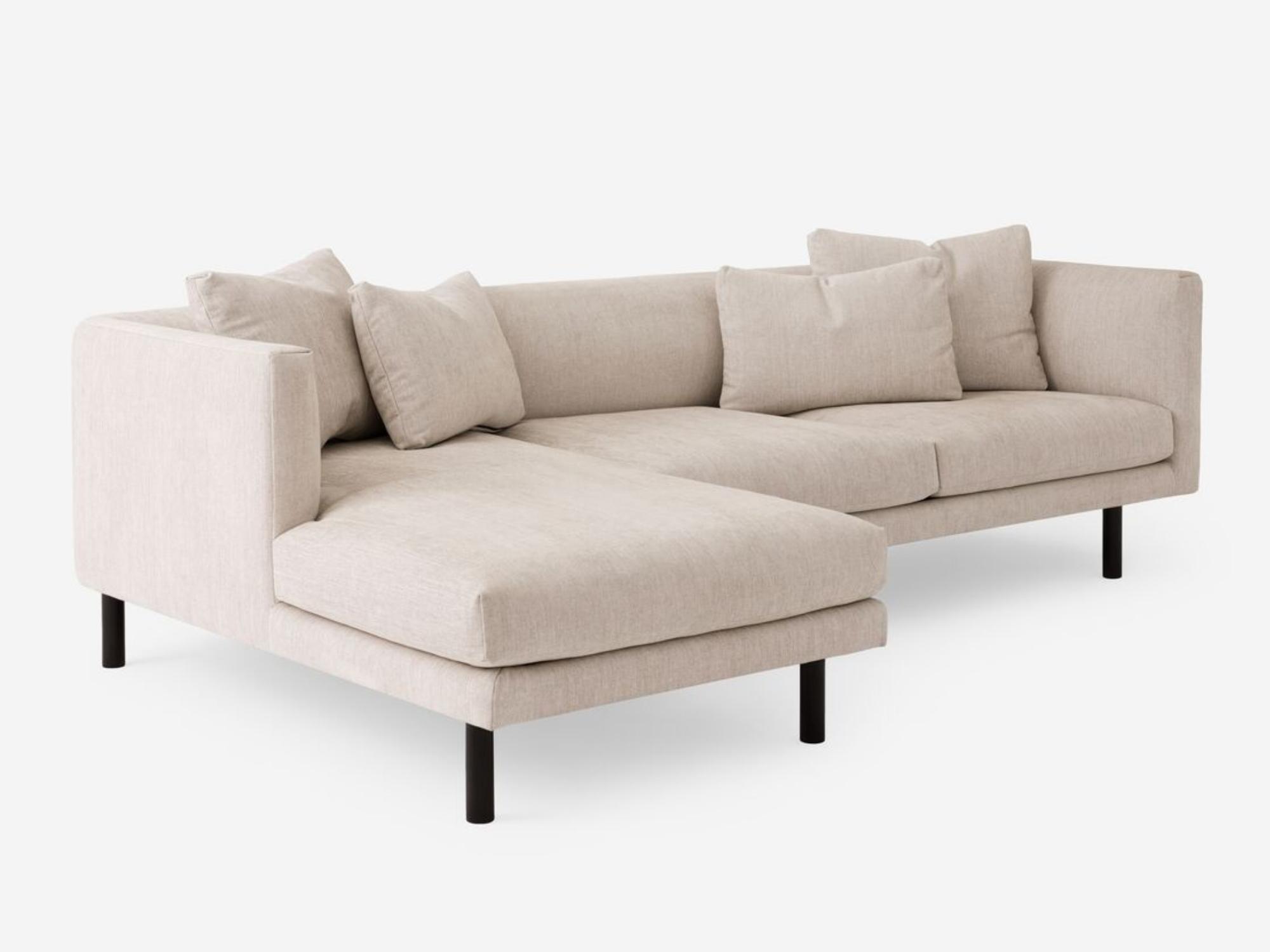 Angled view of the Replay 2-piece modular sofa in beige fabric