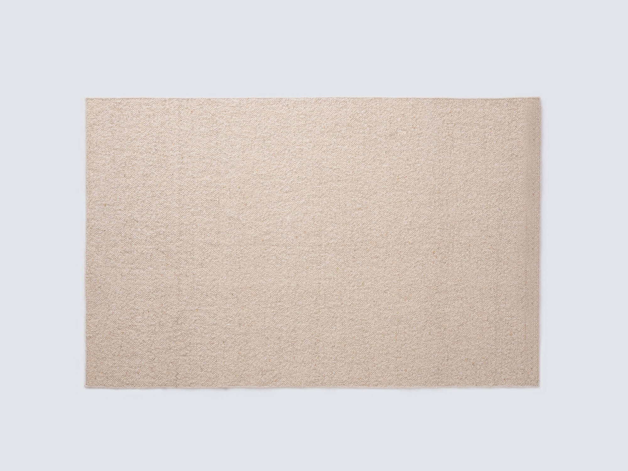 Lush ivory rug top view