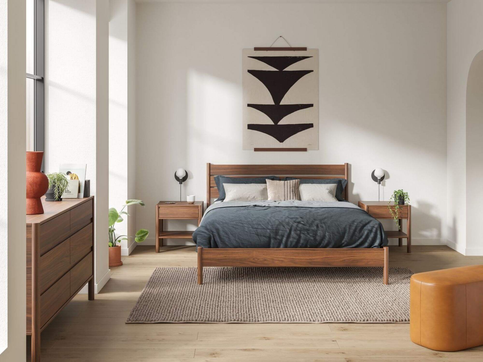 White and black wall lamps above walnut nightstands in modern bedroom