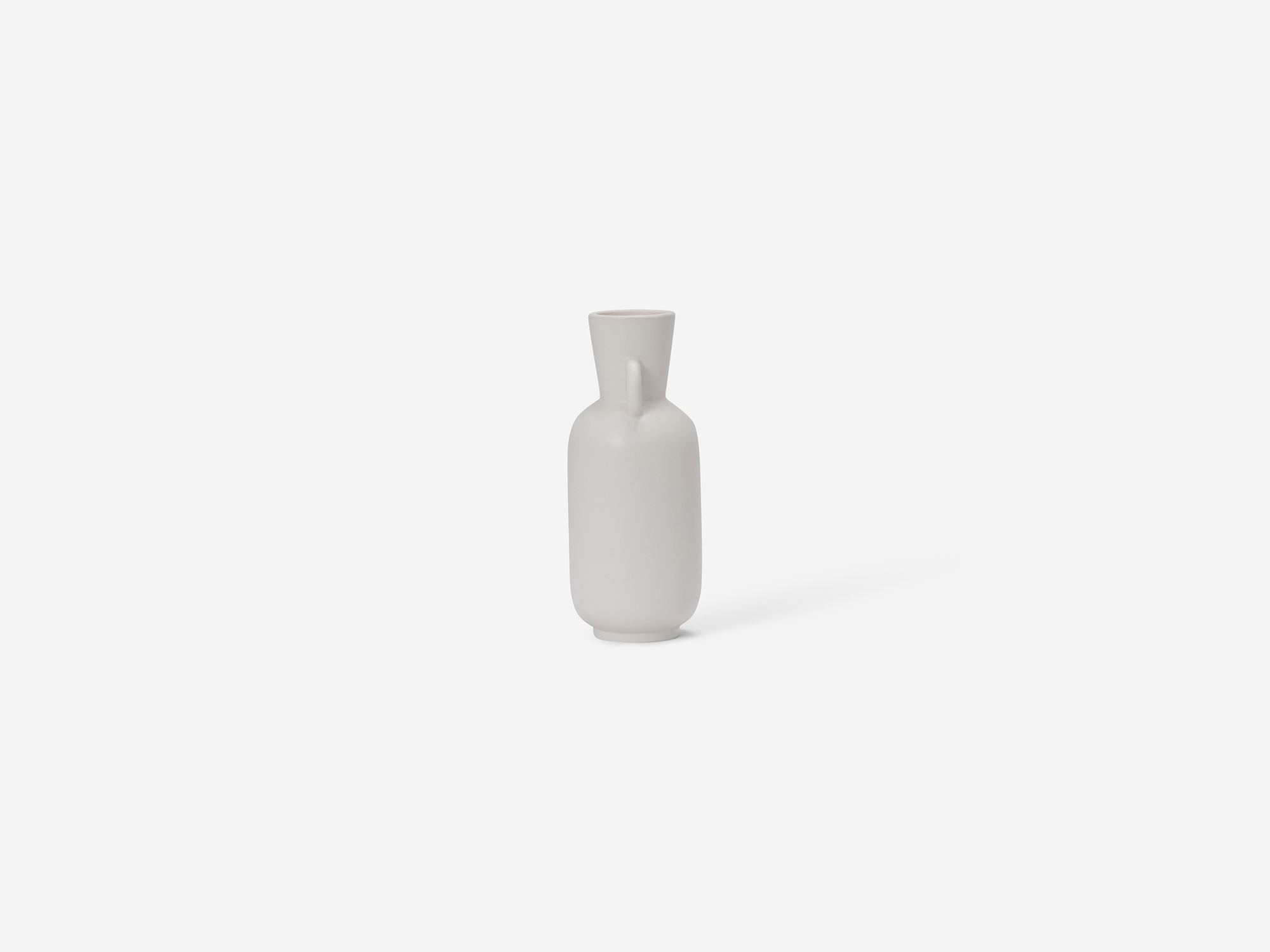 Small white vase side view