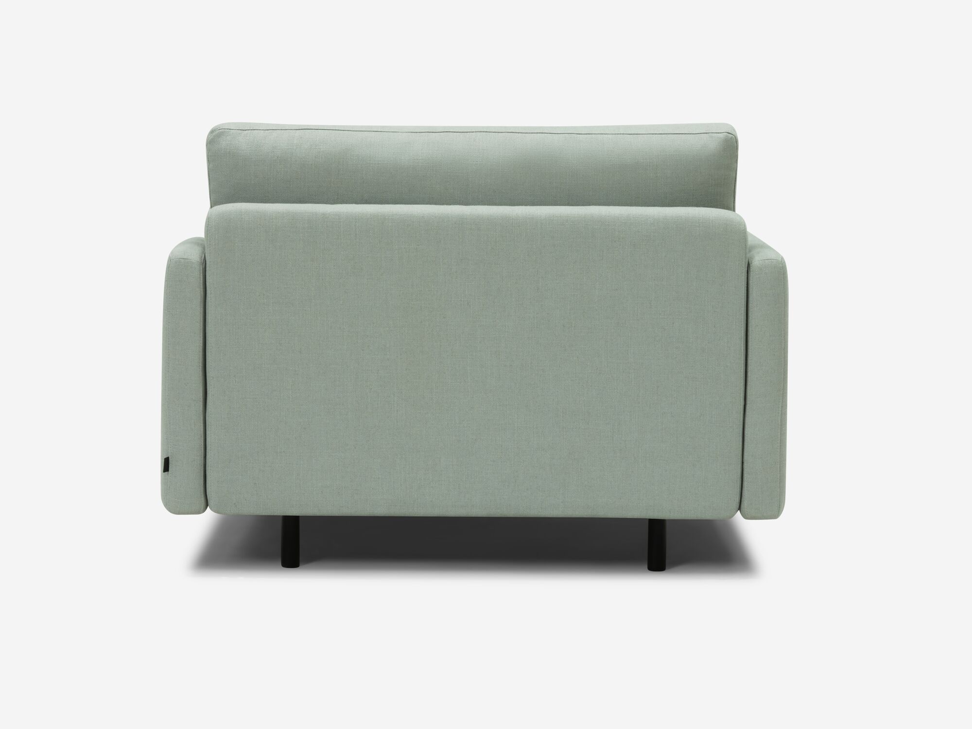 Back view of wide teal armchair
