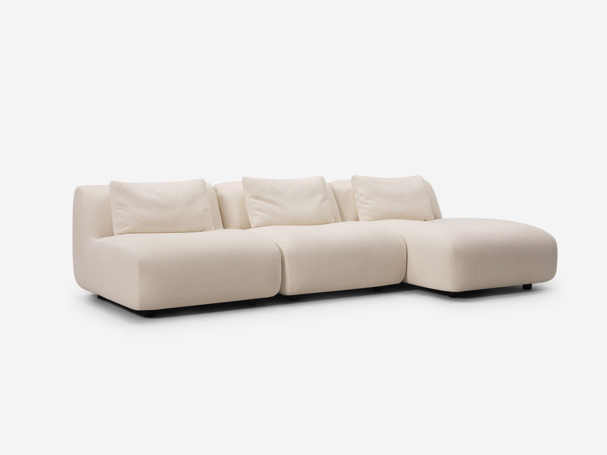 Front angle view of beige armless sectional