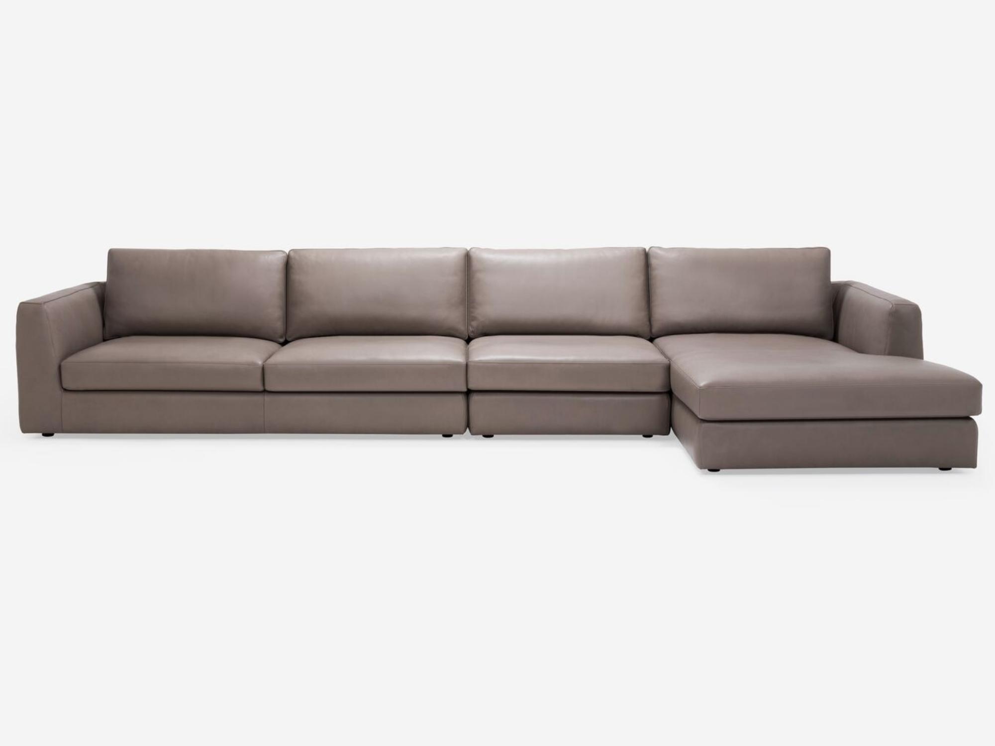 Front view of the modular sofa in beige leather with right hand chaise