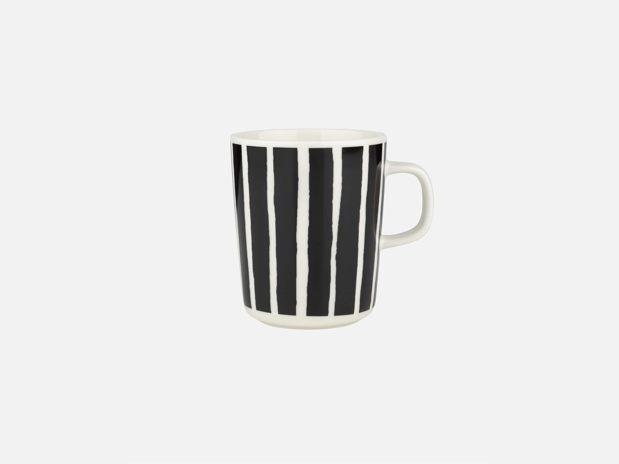 front view of a white and black marimekko mug piccolo pattern