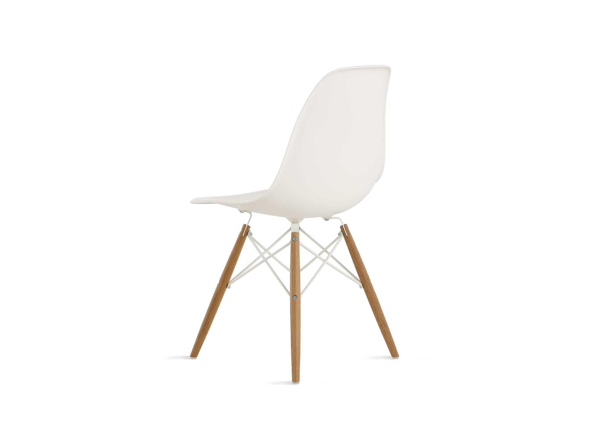 Back angle view of white chair with oak dowels and steel wire