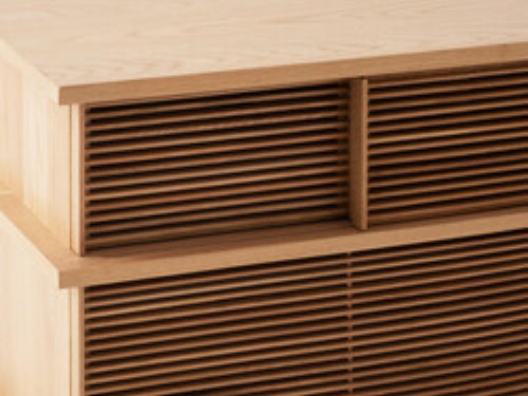 Detail view of the Plank tall modern media console in oak with slats