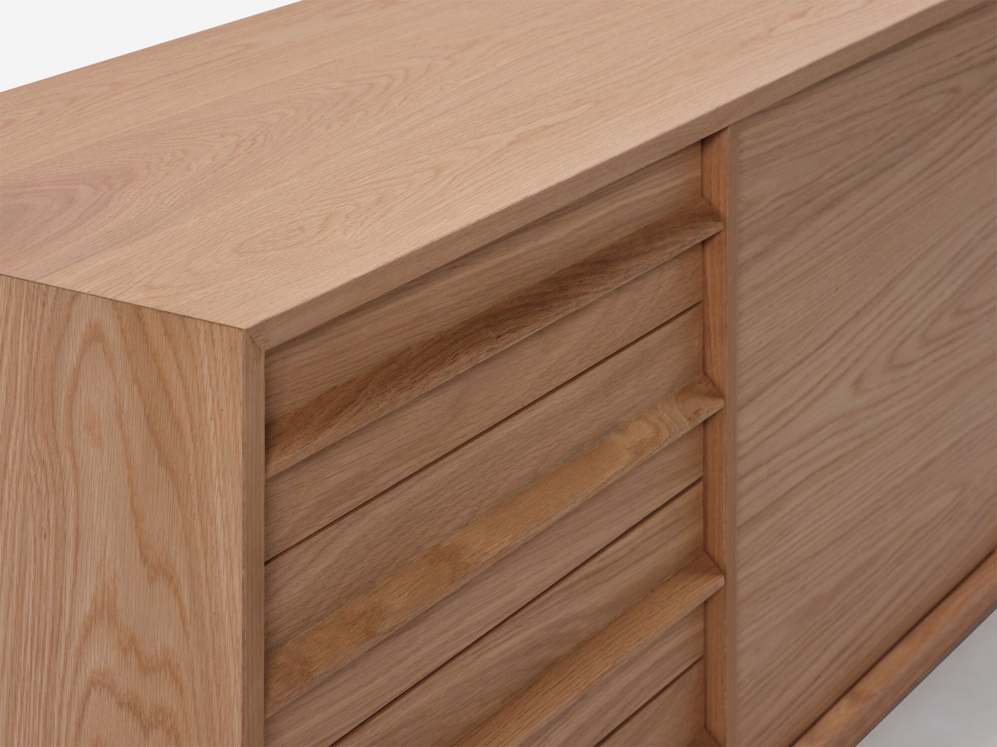 Closed drawer detail view of large oak mid century floating sideboard