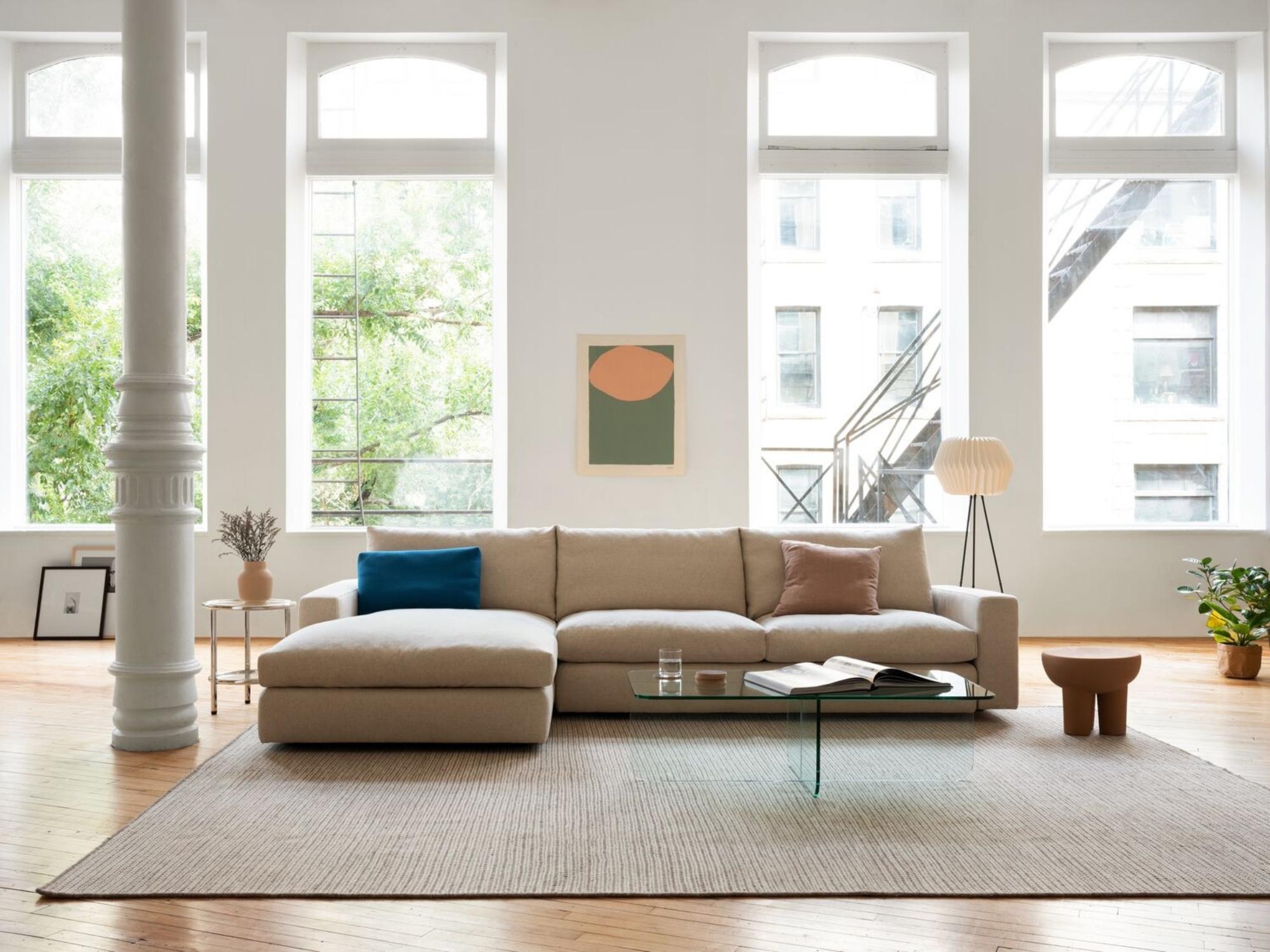 Three leg terracotta stool in bright modern loft living room