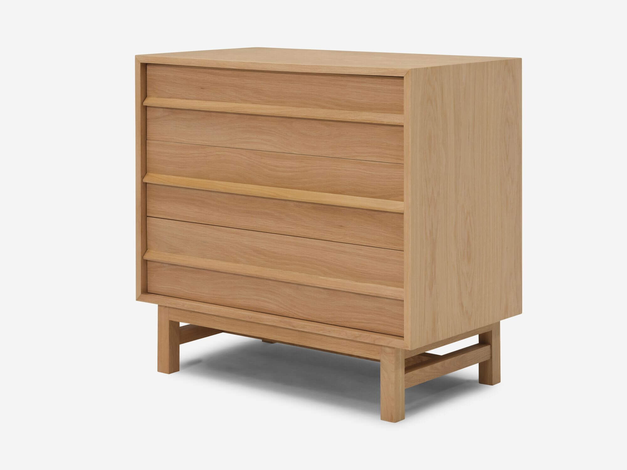 Angled view of the Marcel mid century modern dresser in oak