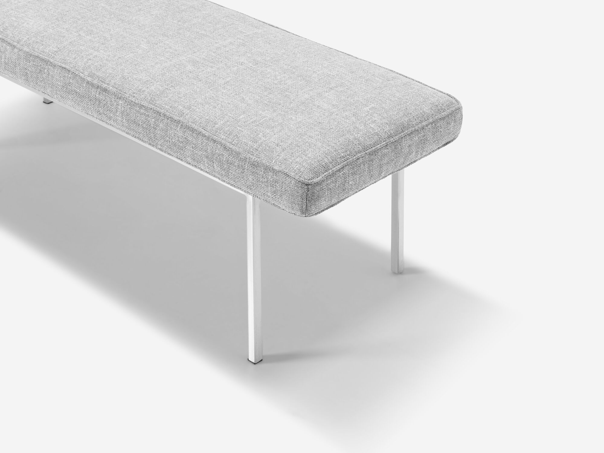 Detail view of the Bank mid century daybed in grey fabric