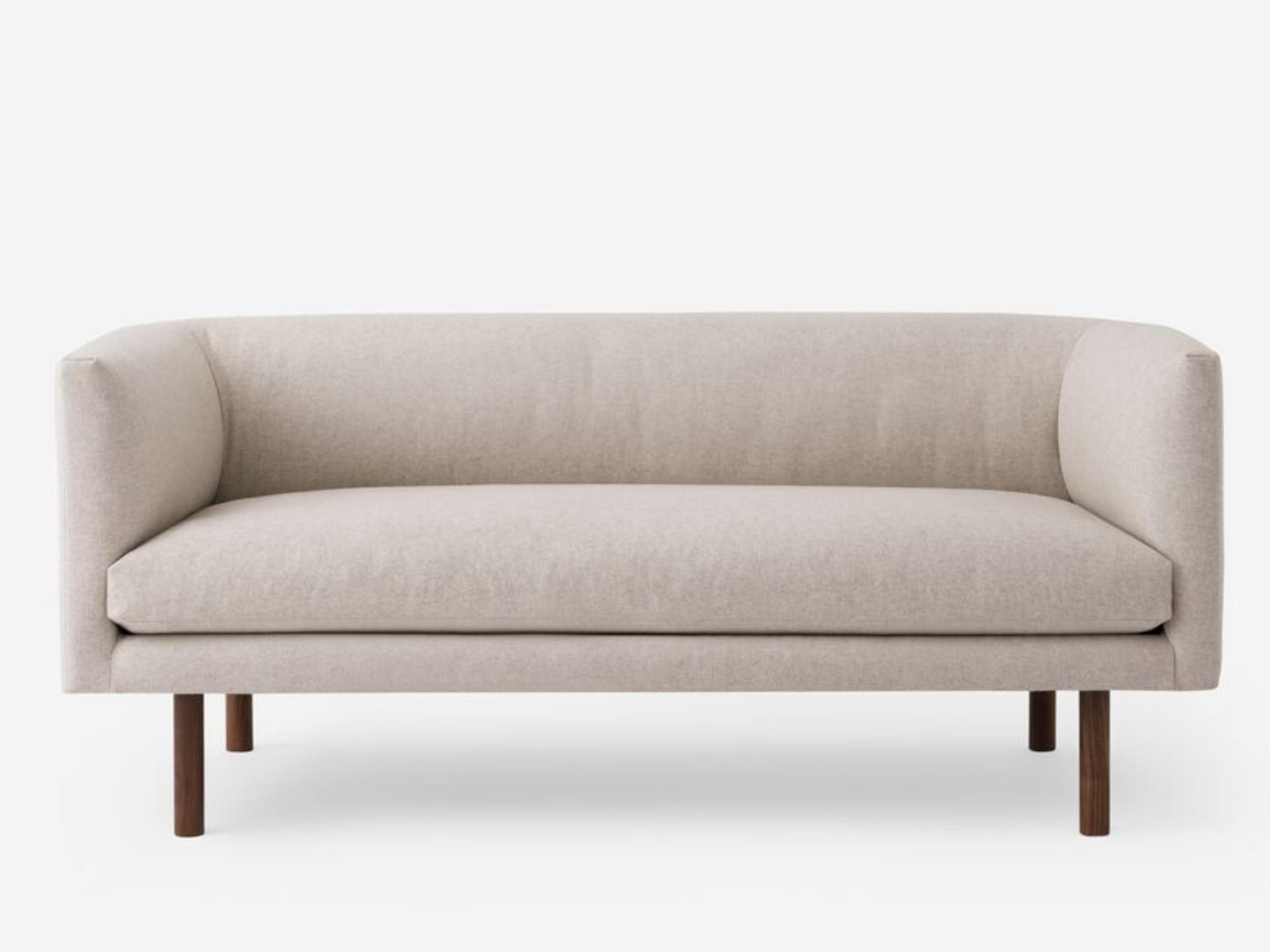 Front view of the Replay modern club loveseat in white fabric