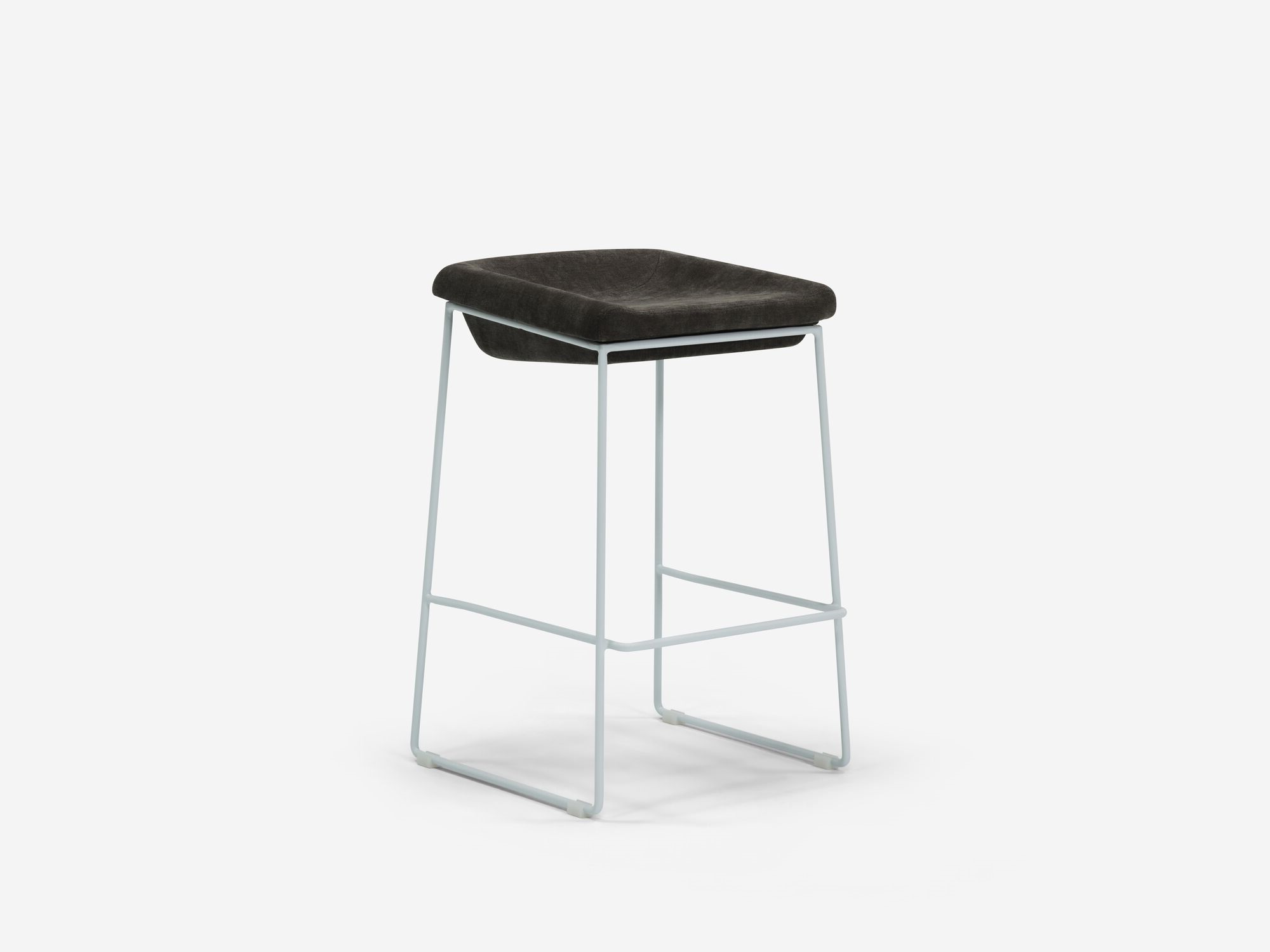 Counter stool with black seat and white legs front angle view