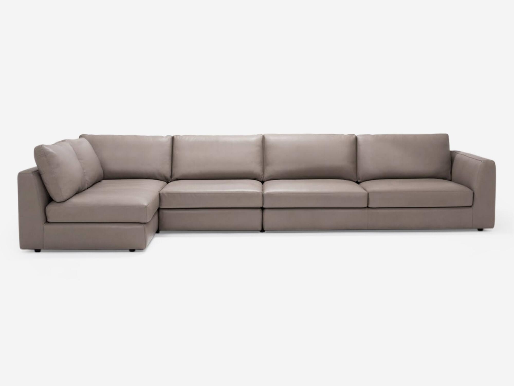 Front view of the Cello 3-piece sectional sofa with full arm chaise in tan leather