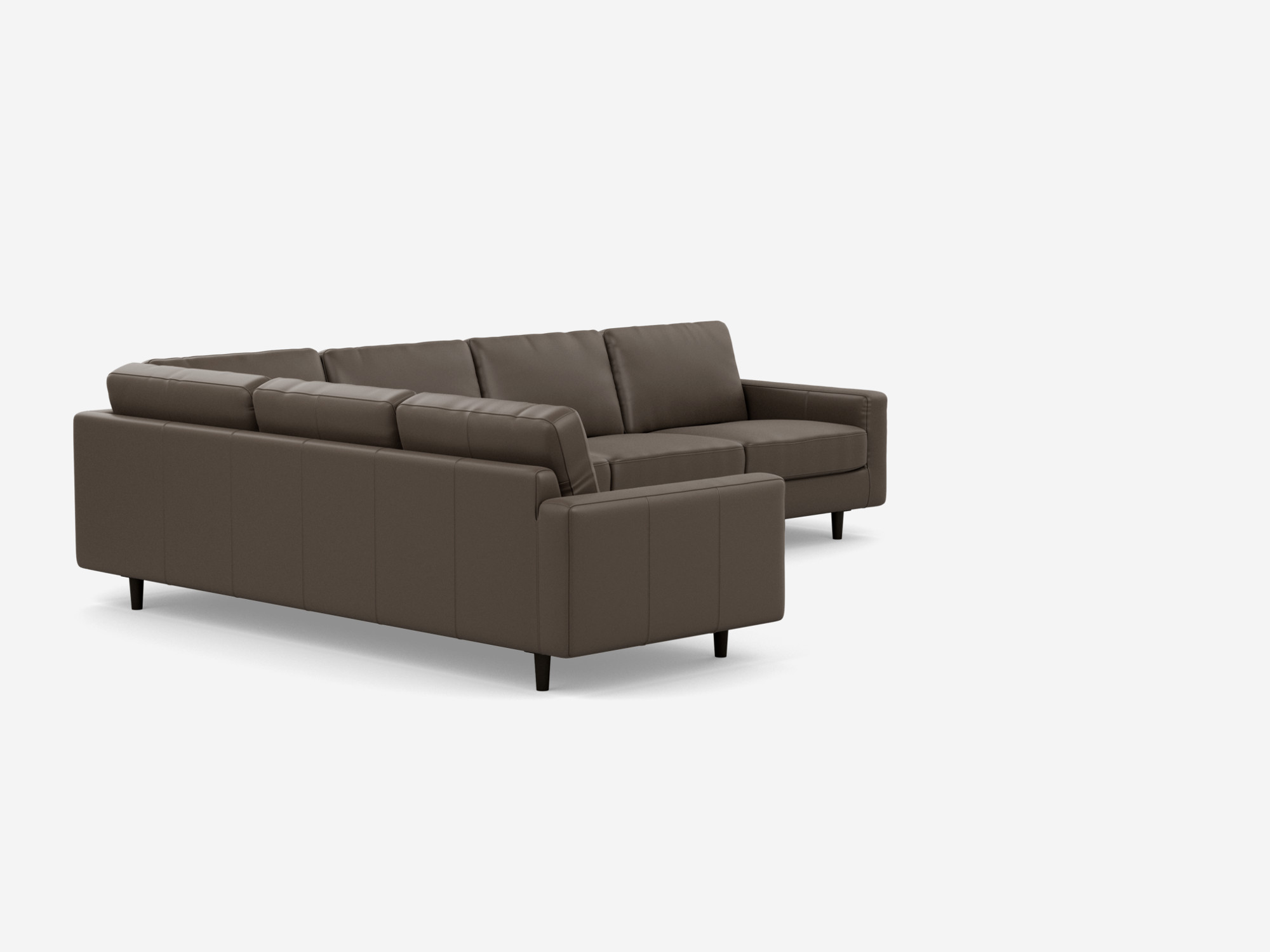 Angled view of the Oskar l shape sofa in dark grey leather