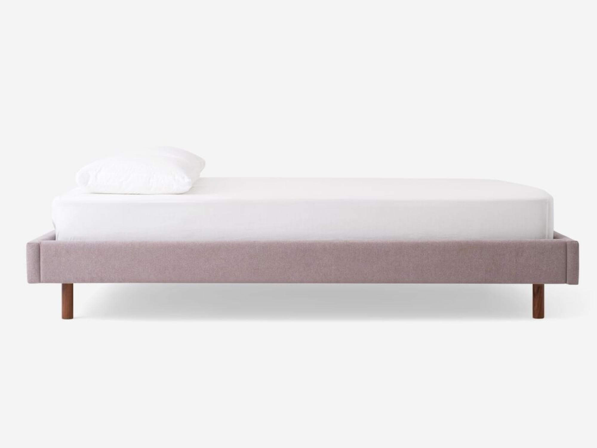Side view of modern floating platform bed, Bento, upholstered in grey fabric