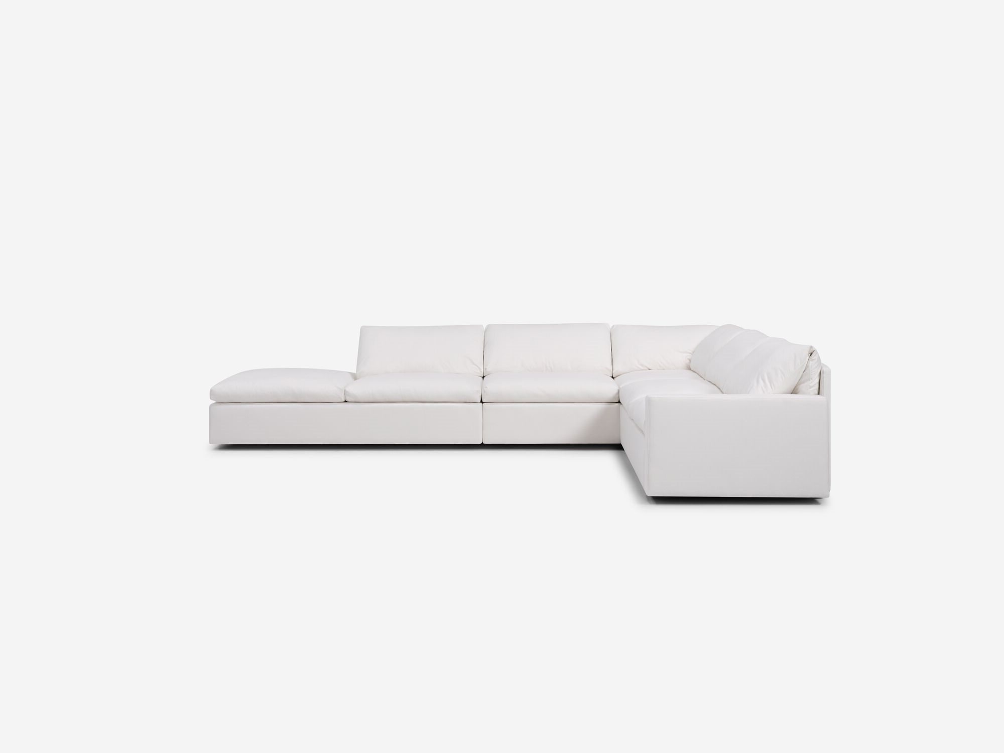 White sectional sofa with left hand chaise side view