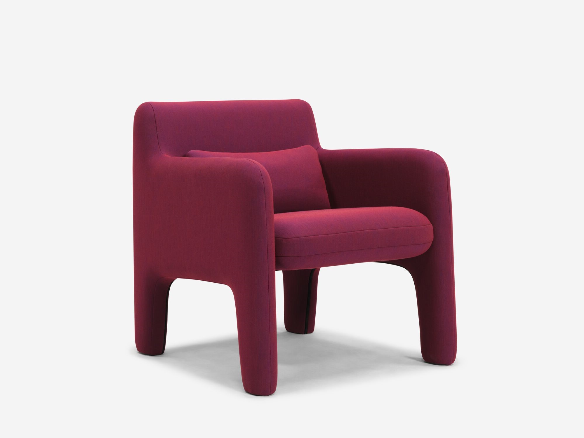 Organic shaped red armchair front angle view