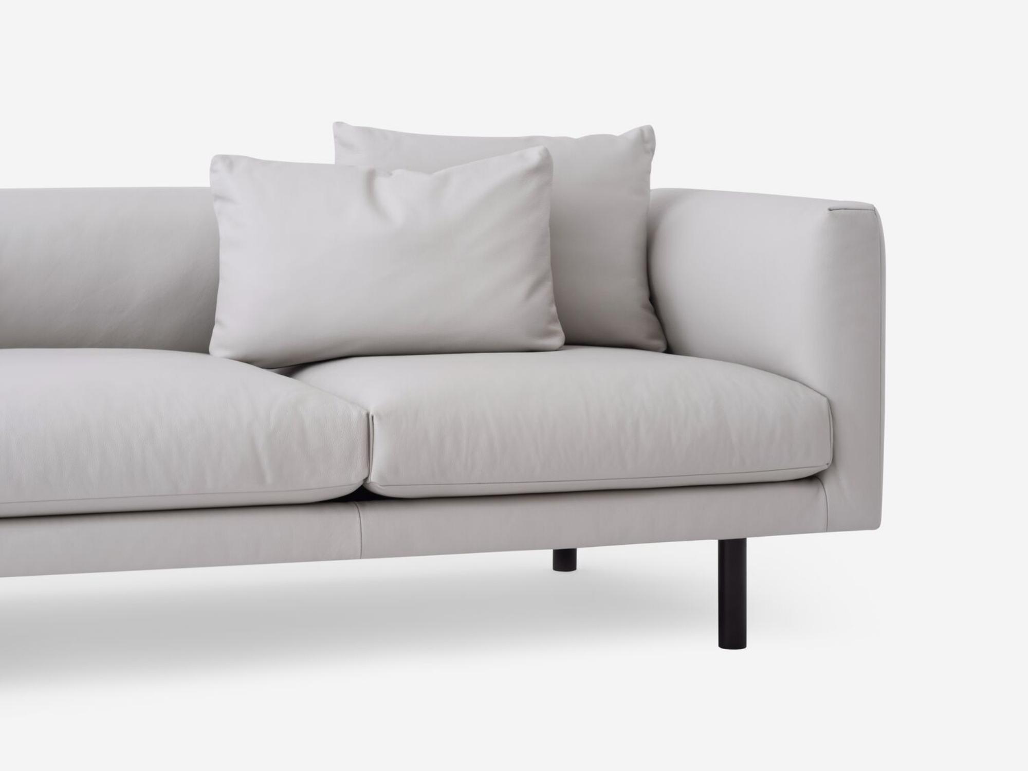 Detail view of the Replay modern sectional sofa upholstered in white leather