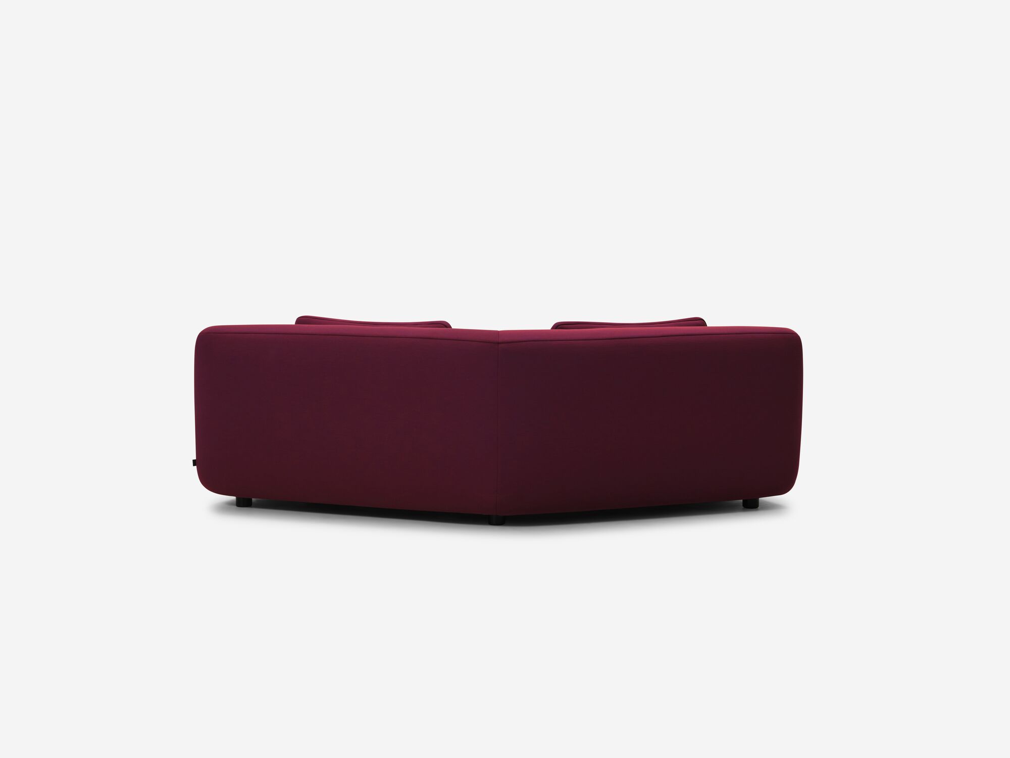 Back view of red purple curved sofa