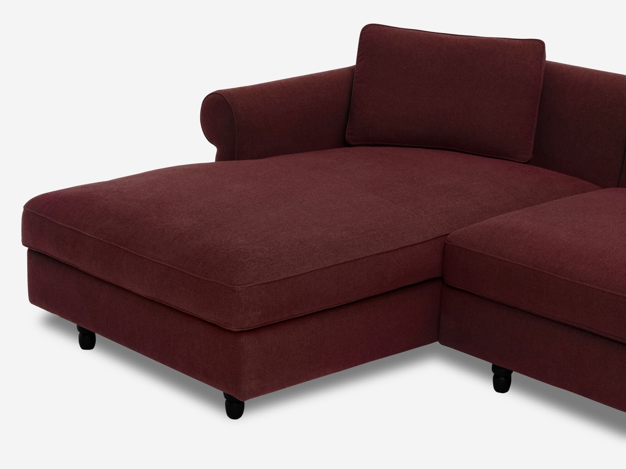 Deep red modern left hand facing sectional sofa chaise detail view