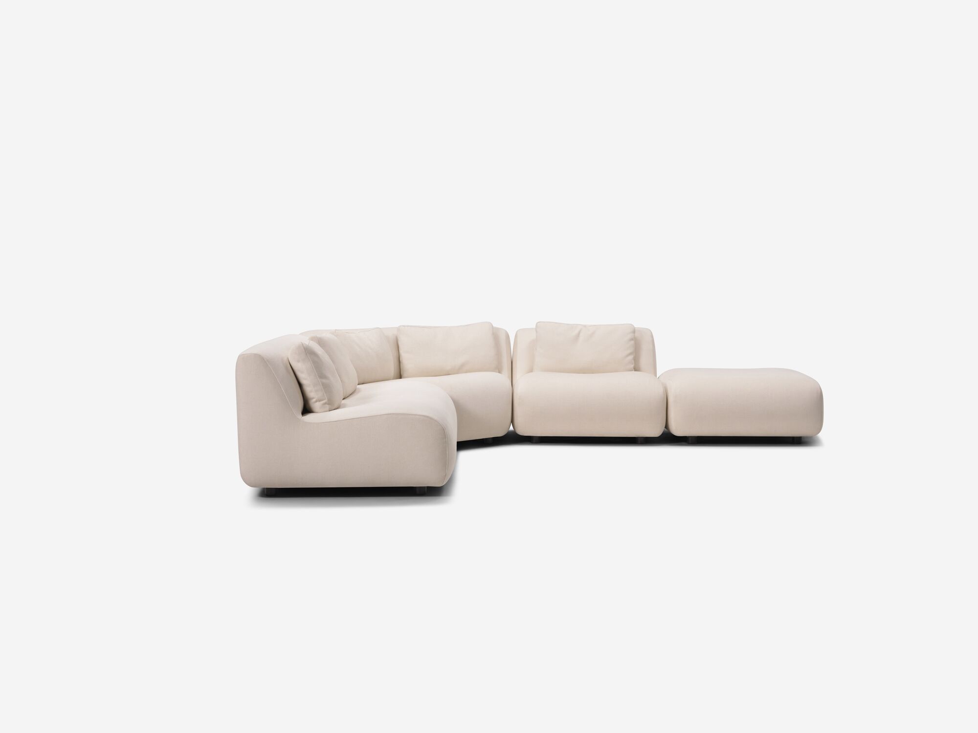 Beige armless sectional sofa side view