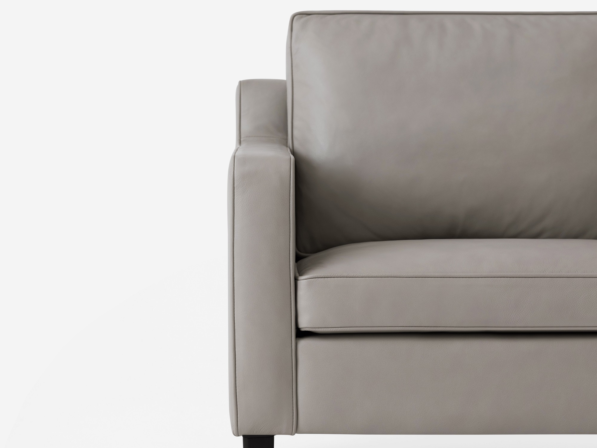 detail arm view of the Skye mid century modern armchair in grey leather