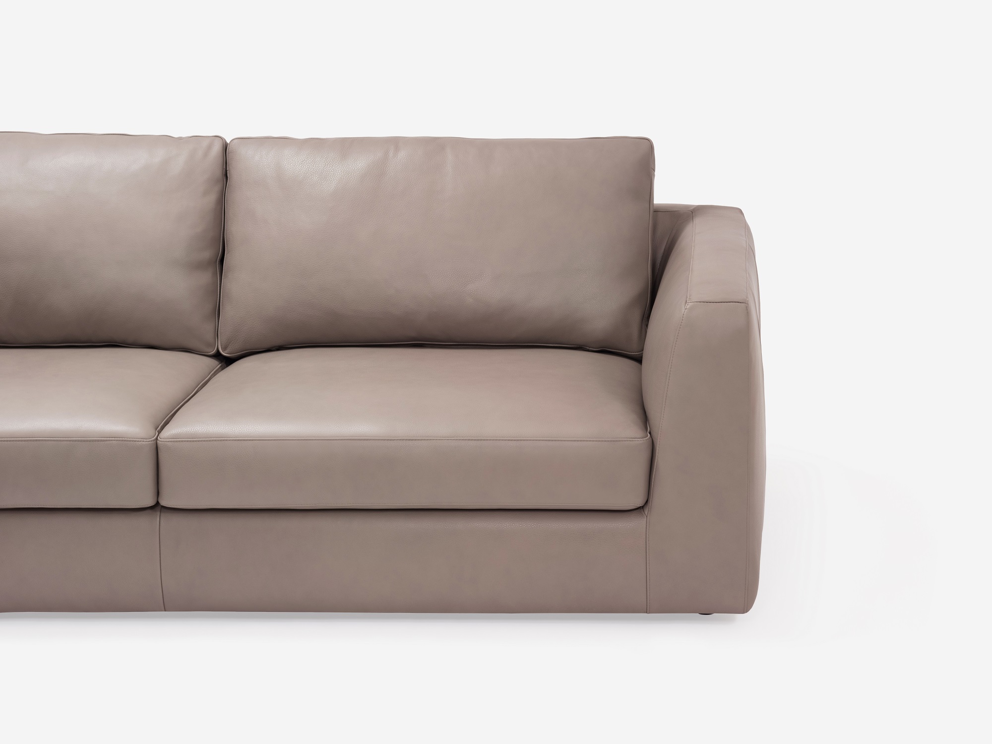 Detail seat view of the Cello modern left hand facing sectional couch in beige leather 