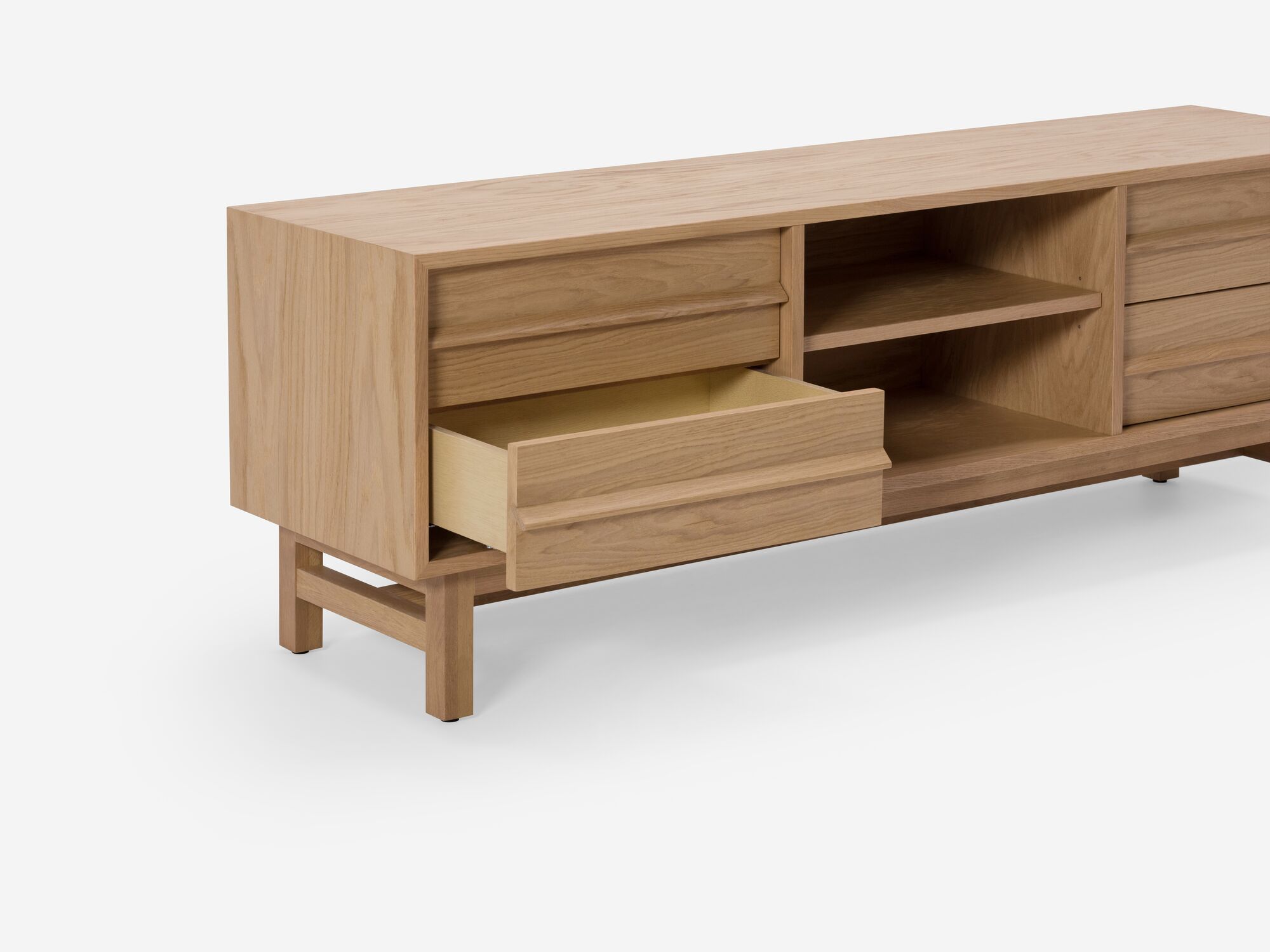 Detail view of small oak media unit bottom drawer