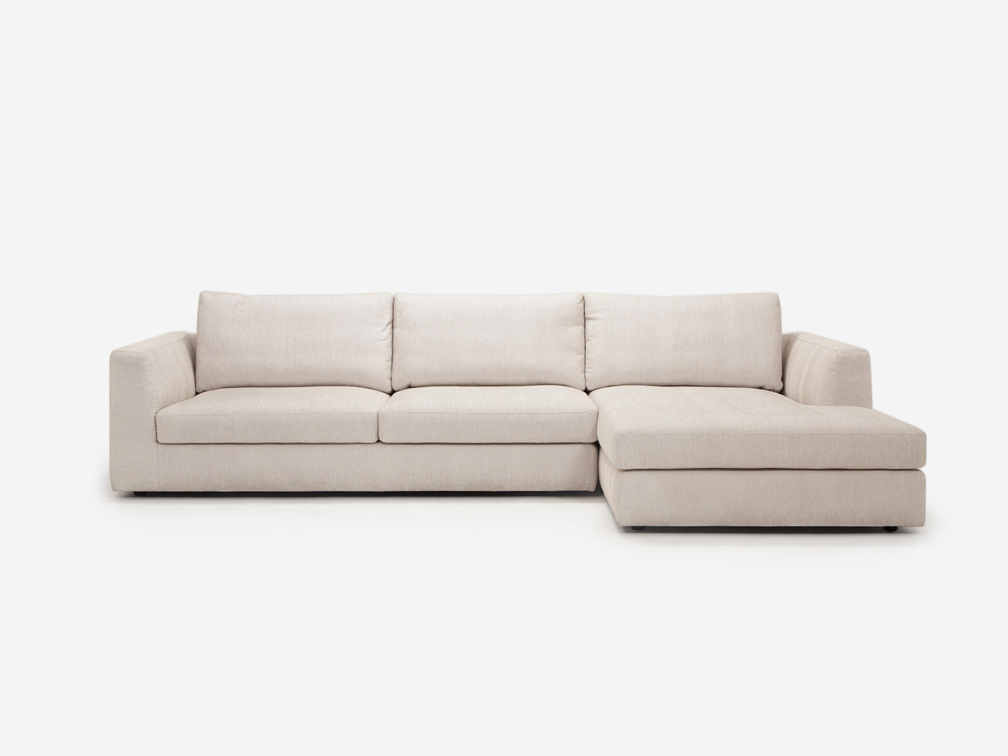 Front view of the sectional sofa in a white fabric