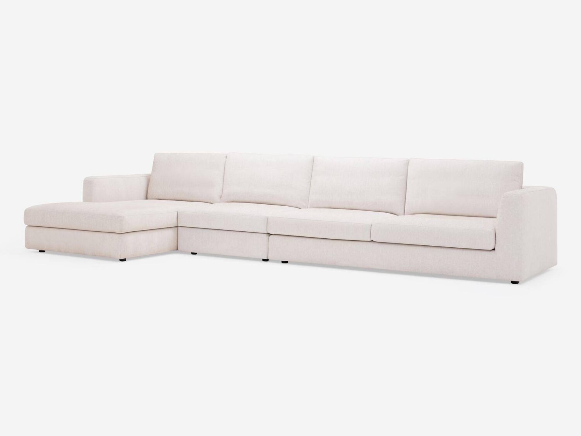 Corner view of the Cello modular sofa in white fabric with left hand chaise