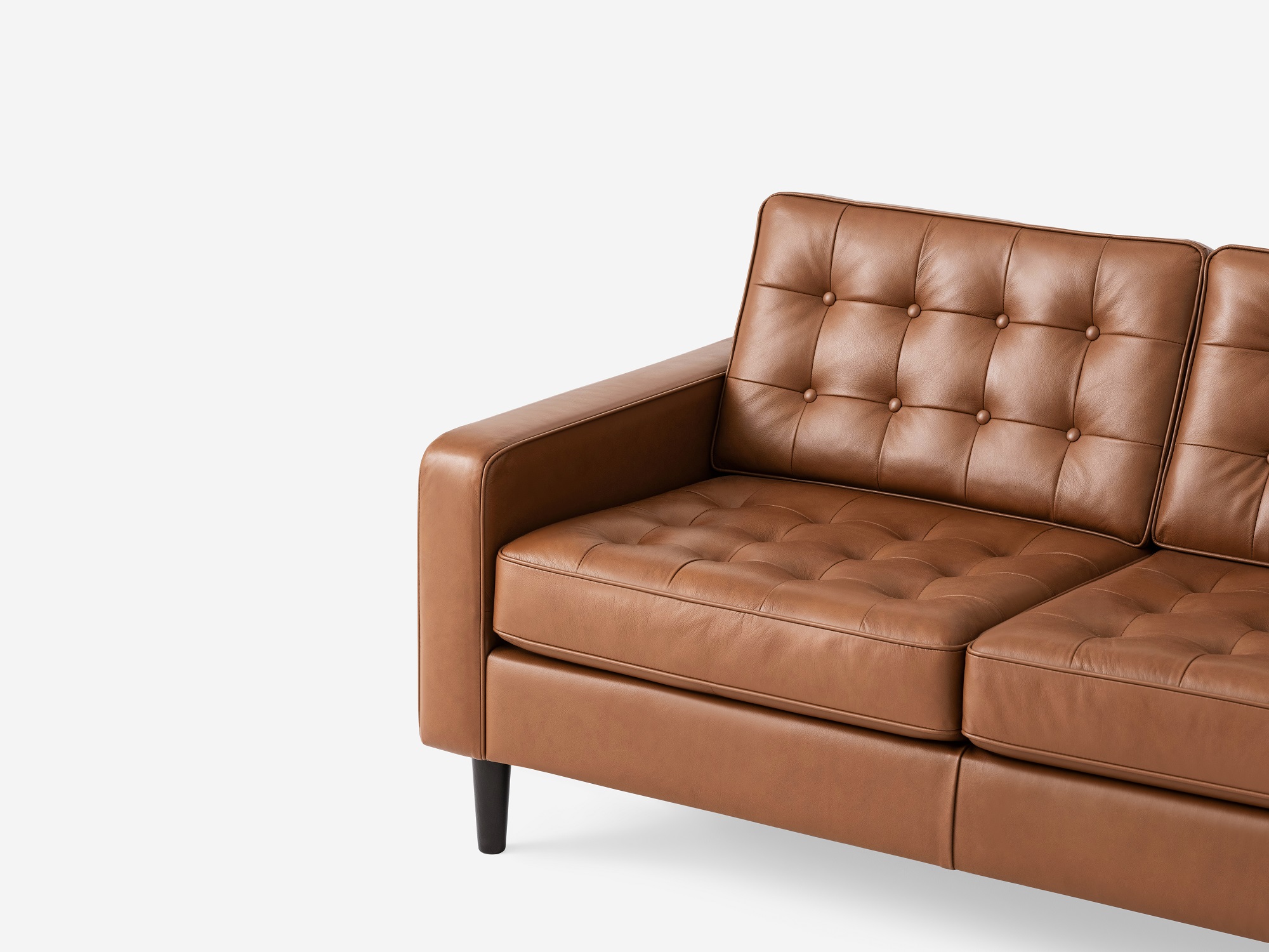 Corner view of the  Reverie modern sectional sleeper sofa in brown leather