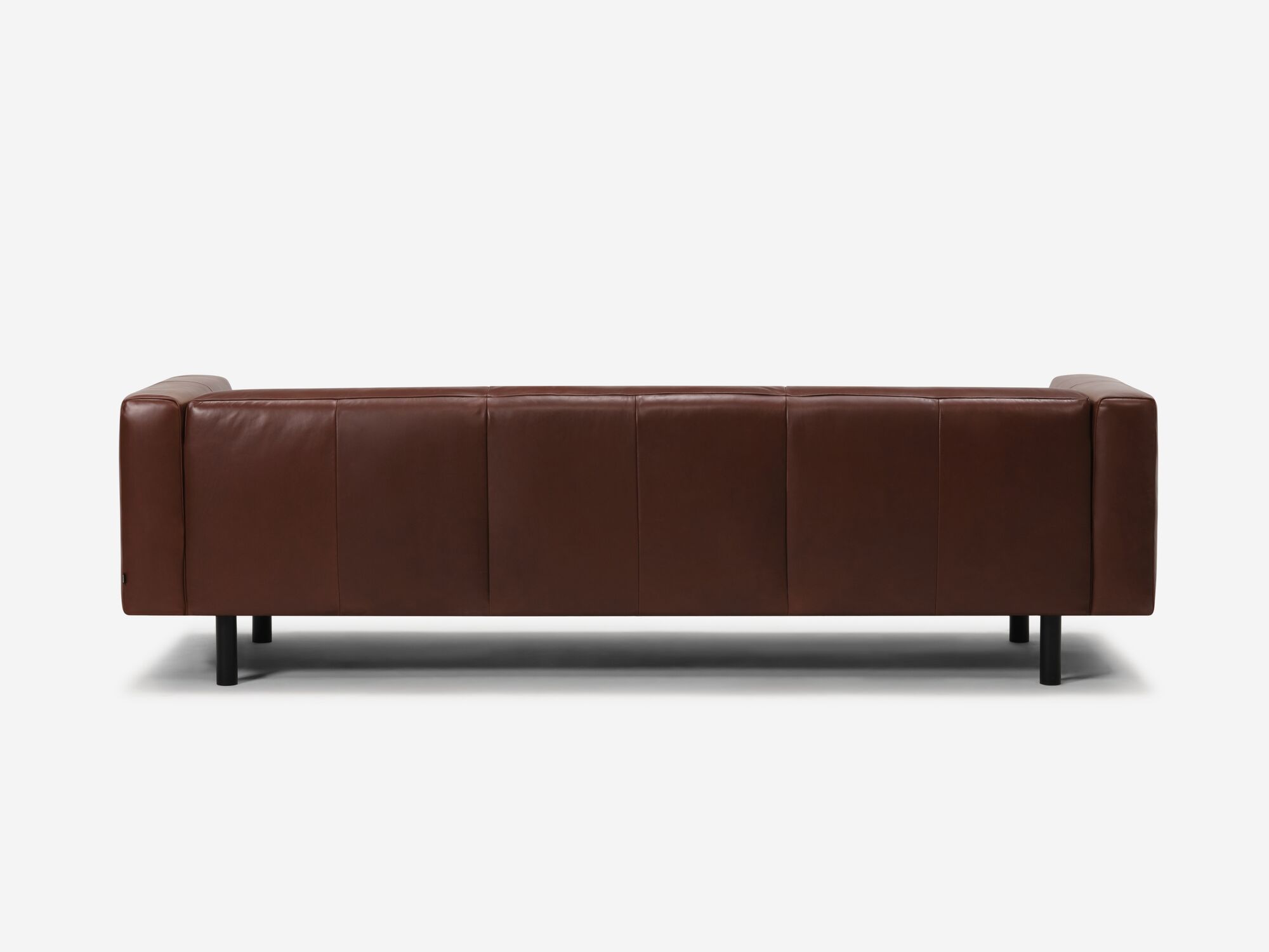 Dark brown leather sofa back view