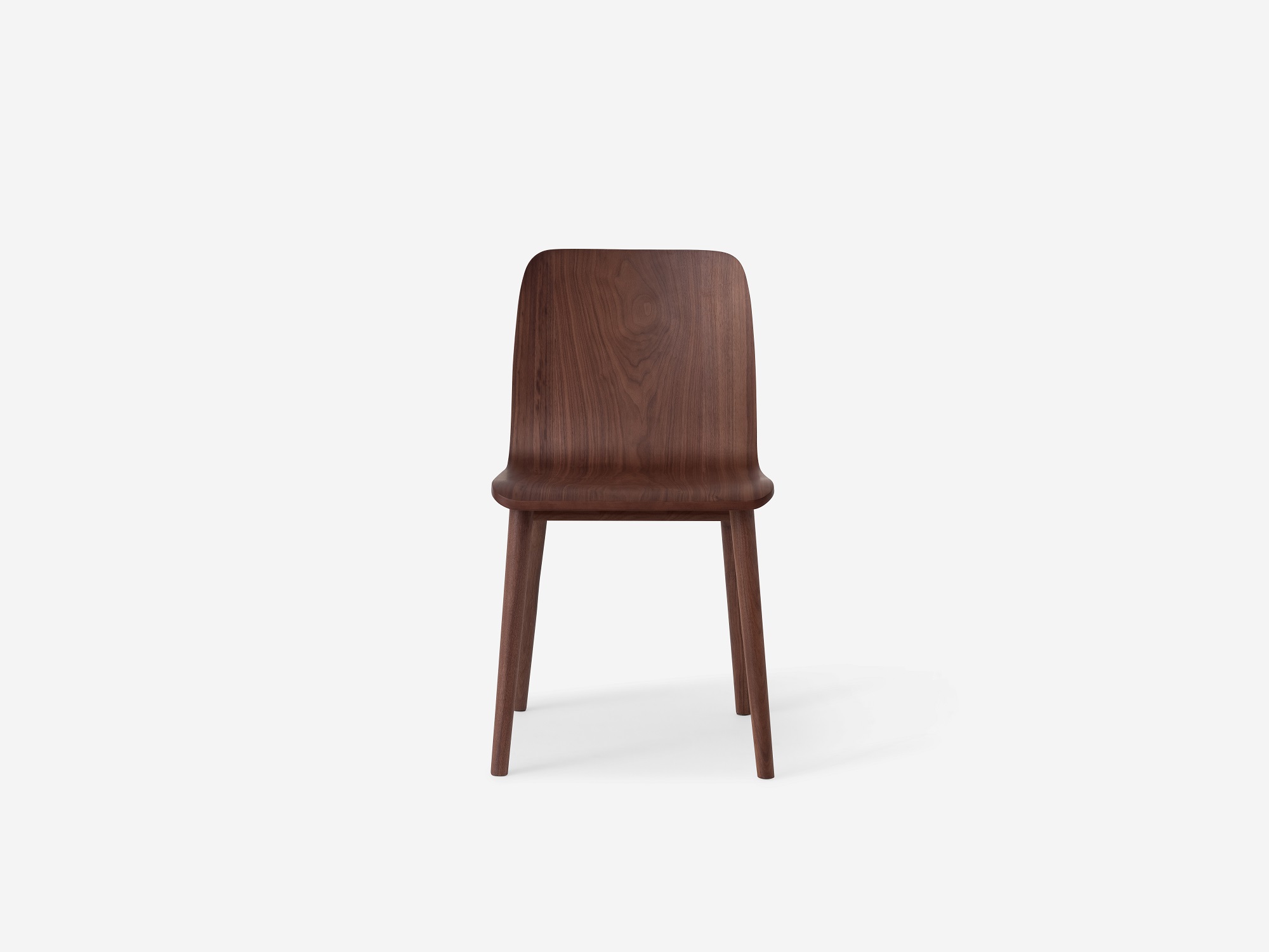 Front view of the Tami mid century dining chair in walnut